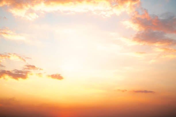 istock Beautiful , luxury soft gradient orange gold clouds and sunlight on the blue sky perfect for the background, take in everning,Twilight, Large size, high definition landscape photo 1932357887