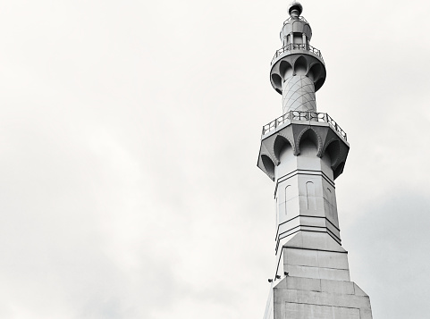 Black and white photo of the Sheikh Zayed Grand Mosque minaret, Surakarta