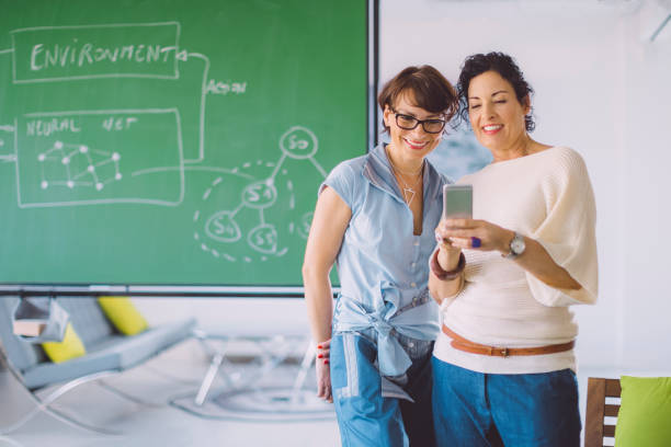 istock Businesswomen working together 1932404036