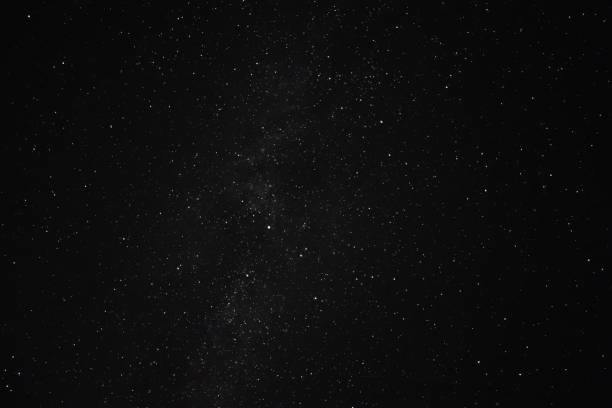 istock Stars and star configurations on black sky at night 1932458121