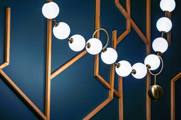 istock Modern template with glowing spheres, wooden planks on blue background. 1932477987