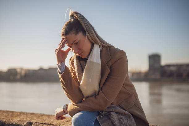 istock Worried woman having headache 1932480707