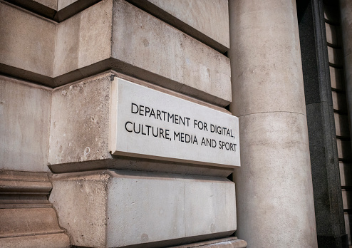 A British Government Department sign in London. The Department for Digital, Culture, Media and Sport has responsibility for a wide range of subjects including sport, the arts, broadcasting, internet, leisure, tourism, museums and creative industries such as advertising, fashion, film etc. It is situated at 100 Parliament Street, London.