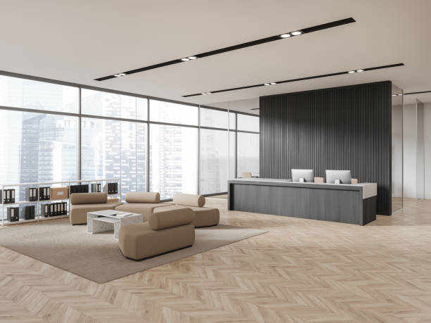 istock White and wooden office corner with reception and armchairs 1932511270