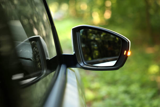 istock Side view mirror of modern car on blurred background, closeup 1932517749