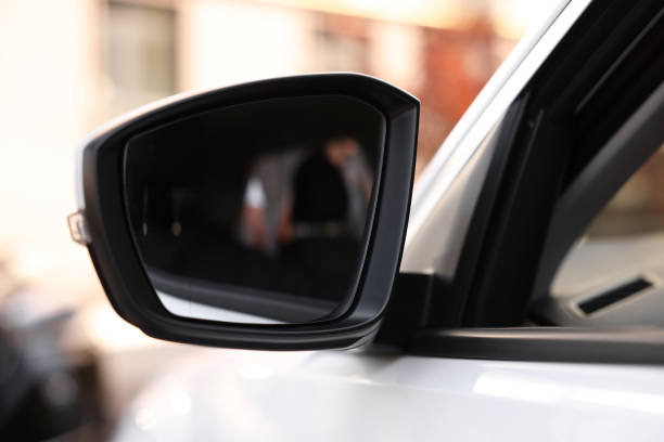 istock Side view mirror of modern car on blurred background, closeup 1932518109