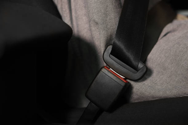istock Fastened safety seat belt in car, closeup 1932518140