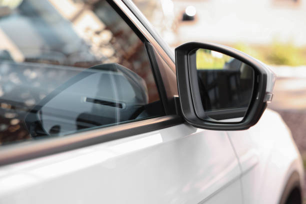 istock Side view mirror of modern car on blurred background, closeup 1932518443