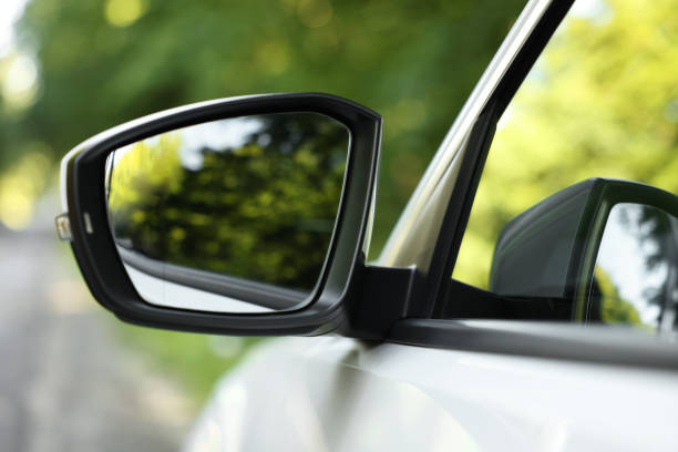 istock Side view mirror of modern car on blurred background, closeup 1932518682