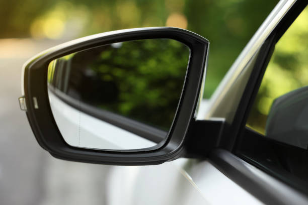 istock Side view mirror of modern car on blurred background, closeup 1932518687