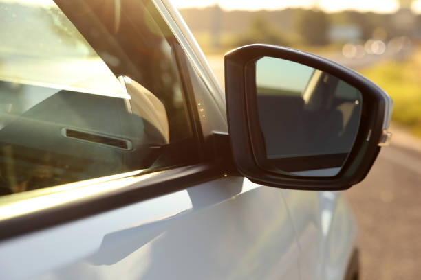 istock Side view mirror of modern car outdoors on sunny day, closeup 1932519208