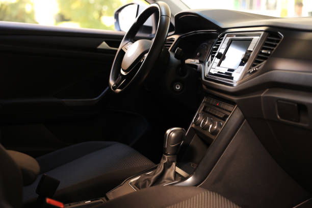 istock View of steering wheel and dashboard inside of modern car 1932519774