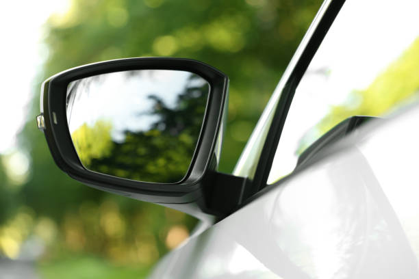 istock Side view mirror of modern car on blurred background, closeup 1932524002