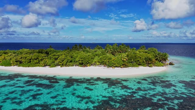 Aerial view of tropical desert island in Maldives