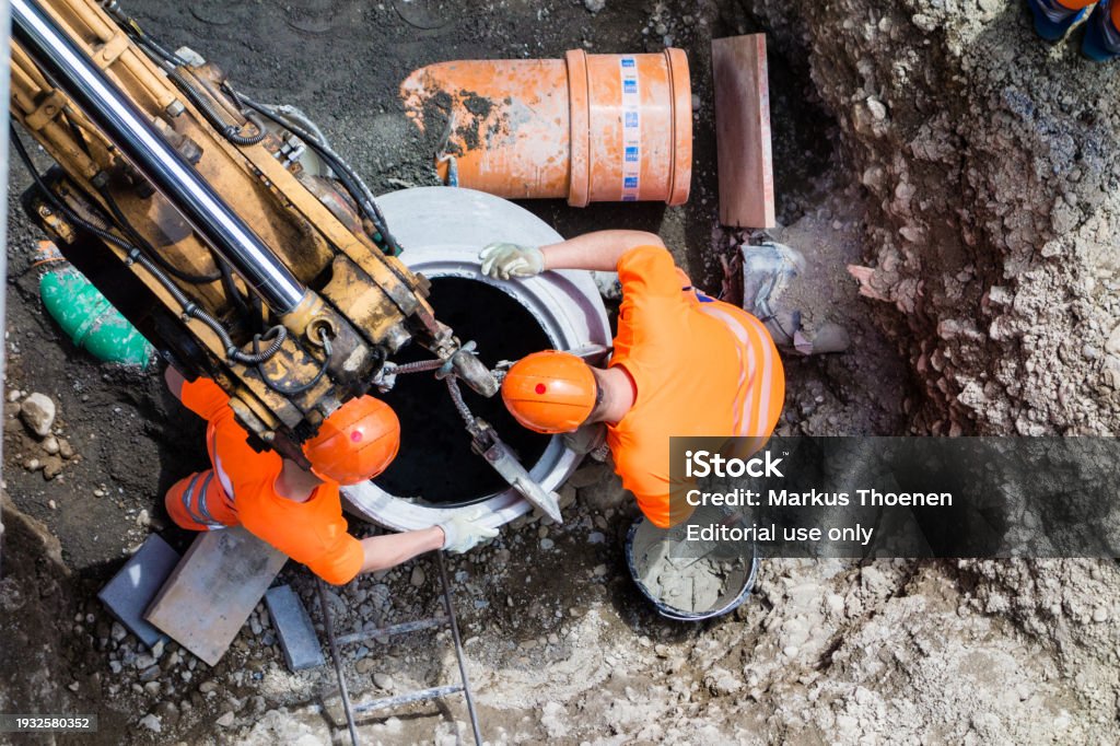 Civil Engineering Labor Two Construction Workers During Civil Engineering Work Stock Photo ...
