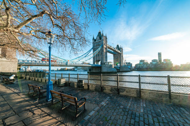 istock Park bench with view to River Thames and Tower Bridge in London 1932584116