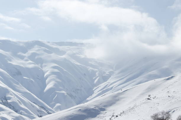 istock snowy mountains and nature landscape 1932610670