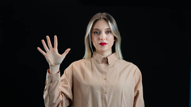 istock Nice young woman using transparent screen, Authentication by facial recognition concept. Biometric. Security system. Technology concept. 1932624401