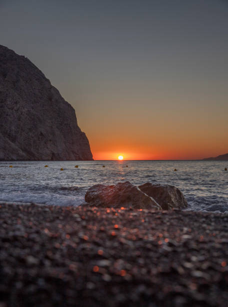 istock Sunset at the Black beach Perissa Santorini 1932633153
