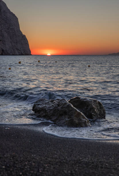 istock Sunset at the Black beach Perissa Santorini 1932633345