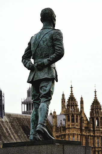 Central London, England United Kingdom UK – December 26th, 2023: The UK Parliament and The statue of Jan Christian Smuts – The capital city of England, The United Kingdom, street photography at daytime. The statue of Mr. Jan Christian Smuts.\n\nA life-size bronze statue of Jan Smuts was designed and made by the British artist Jacob Epstein stands on the north side of Parliament Square in London, United Kingdom, it is still located between a statue of Lord Palmerston and a statue of David Lloyd George. The statue was made and opened in 1956.