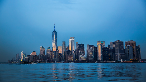 View of Manhattan from Hudson bay at twilight, New York City, USAManhattan by night from Hudson Bay, New York City, America