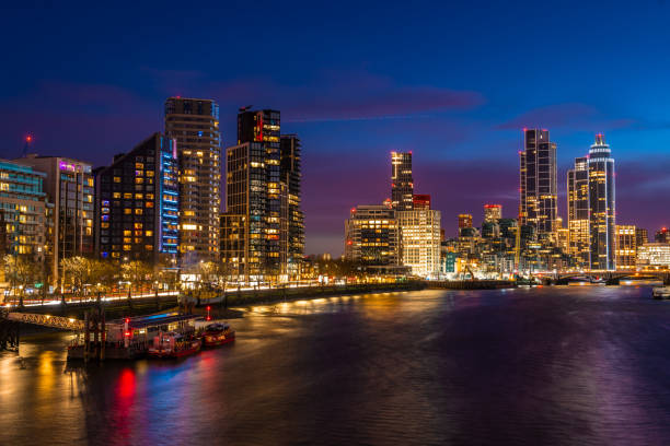 view of the st george wharf area illuminated by a beautiful sunset - london england apartment uk real estate fotografías e imágenes de stock