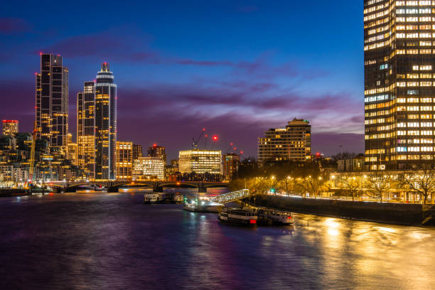 view of the st george wharf area illuminated by a beautiful sunset - london england apartment uk real estate fotografías e imágenes de stock