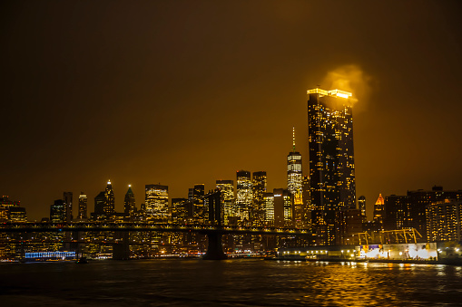 View of Manhattan from Brooklyn bride by night, New York City, USA