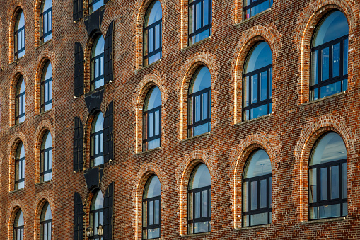 Detail of old building facade in Red hook, Brooklyn, New York, USAOld brick wall facade building in Red Hook, Brooklyn, New York