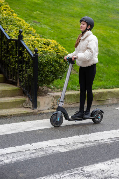 istock Urban Crossing on an Electric Scooter. 1932733620