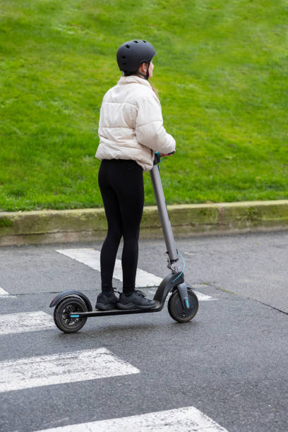 istock Urban Crossing on an Electric Scooter. 1932733623