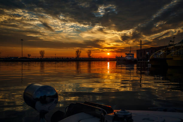 Leaving pier to Upper Bay at sunset in Red Hook, Brookyn, New York
