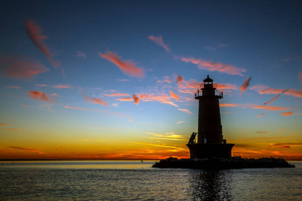 istock West bank lighthouse at sunrise 1932741180
