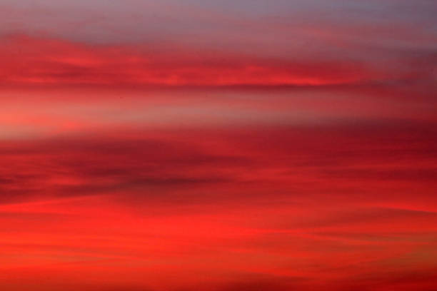 Sunset Sunrise in the sky with few clouds