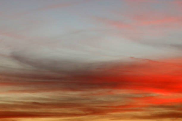 Sunset Sunrise in the sky with few clouds