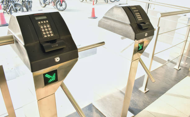 istock A closeup picture of a Biometric attendance machine with turnstile, 1932764183