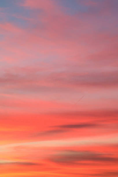 istock Sunset Sunrise in the sky with few clouds 1932764509