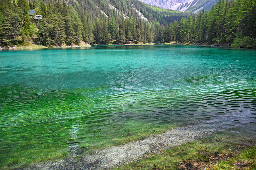 Fusine Lakes, two small lakes of glacial origin connected to each other by paths and located at the base of the Mangart mountain range (7 shots stitched)