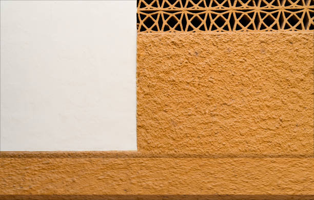 Yellow,White Background,Studio Room Concrete Wall Rough Texture Surface with Cut off Geometric Pattern,Orange cement old building wall plaster texture,Minimal Backdrop for product designs present