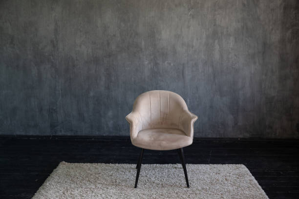 istock Vintage chair in empty dark home room interior 1932792121