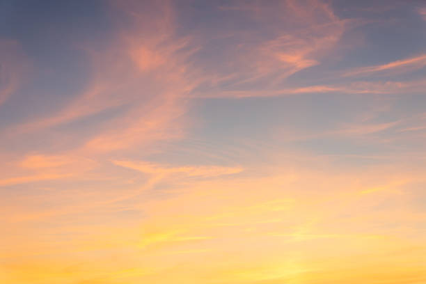 istock Beautiful colorful dramatic sky with clouds at sunset or sunrise. 1932854119