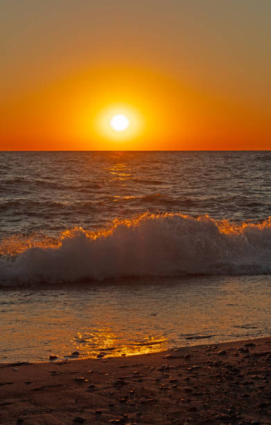 istock Catching the Rays of Sunset in the Waves 1932869043