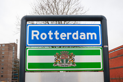 Rotterdam, Netherlands - January 12, 2024: Location sign and coat of arms of the city of Rotterdam.