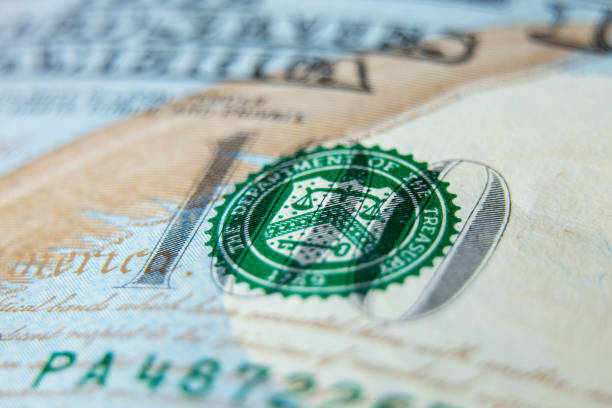 istock One hundred dollars as a macro photo background, 100 dollars, business 1932927596