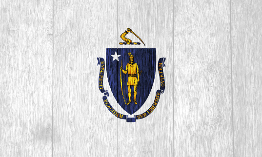 Flag of Massachusetts USA state on a textured background. Concept collage.