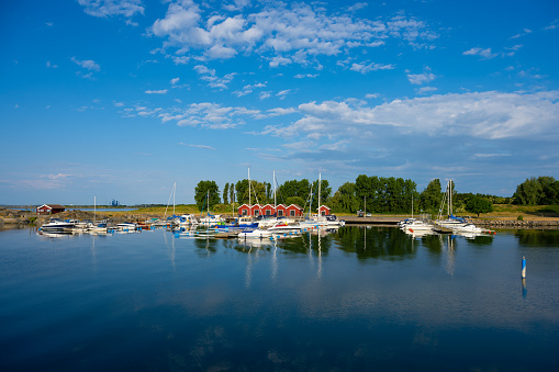 Gothenburg, Sweden - June 15 2023: Small marina on an extra calm day.