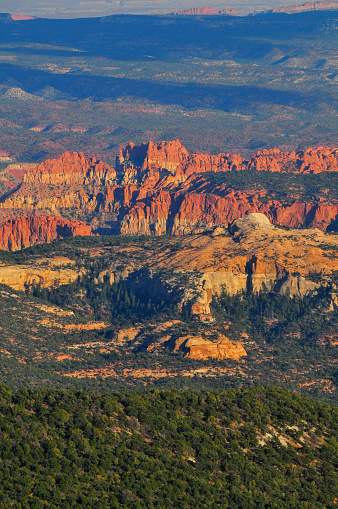 A panoramic view from Utah Scenic Byway 12 on the slopes of Boulder Mountain towards the convoluted landscape of Grand Staircase-Escalante NM and Capitol Reef NP, Utah, Southwest USA.