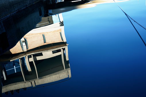 Reflection of Marseille's rowing club building - stock photo