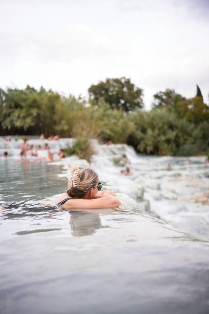 istock Young woman enjoys thermal springs 1933015682